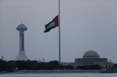 The UAE flag flies at half-mast in Abu Dhabi during a three-day mourning period declared after 45 Emirati soldiers died in Yemen in September 2015. Ravindranath K / The National