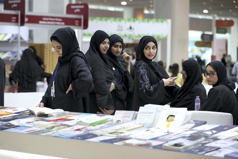 ABU DHABI,  UNITED ARAB EMIRATES , April 24 – 2019 :- Visitors browsing books at the Abu Dhabi International Book Fair held at Abu Dhabi National Exhibition Centre in Abu Dhabi. ( Pawan Singh / The National ) For News/Online/Instagram. Story by Rupert