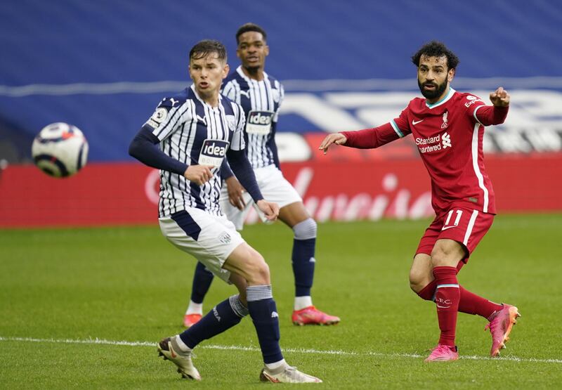 Mohamed Salah scores for Liverpool. EPA