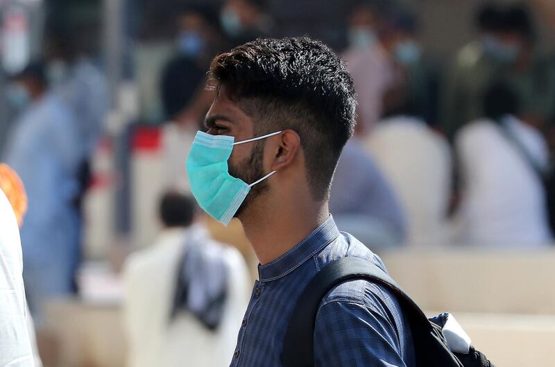 DUBAI, UNITED ARAB EMIRATES , October 9 – 2020 :- A man wearing protective face mask as a preventive measure against the spread of coronavirus in Bur Dubai area in Dubai. (Pawan Singh / The National) For News/Stock/Online.