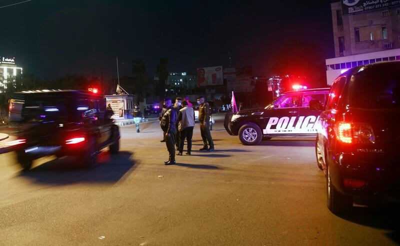 Security forces patrol in the streets of Baghdad at the start of the new curfew to counter the spread of Covid-19. Iraq re-imposed partial lockdown measures until early March after detecting a new strain of the coronavirus, including among children.  AP Photo