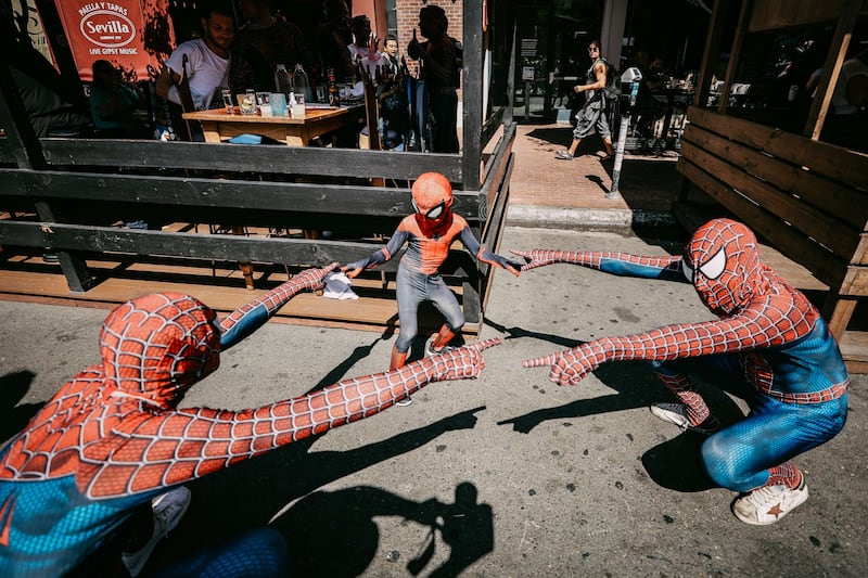 More cosplayers with Spidey senses. Getty Images
