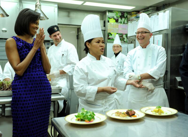 Ms Comerford in the kitchen with then-first lady Michelle Obama. Photo: Obama White House Archives