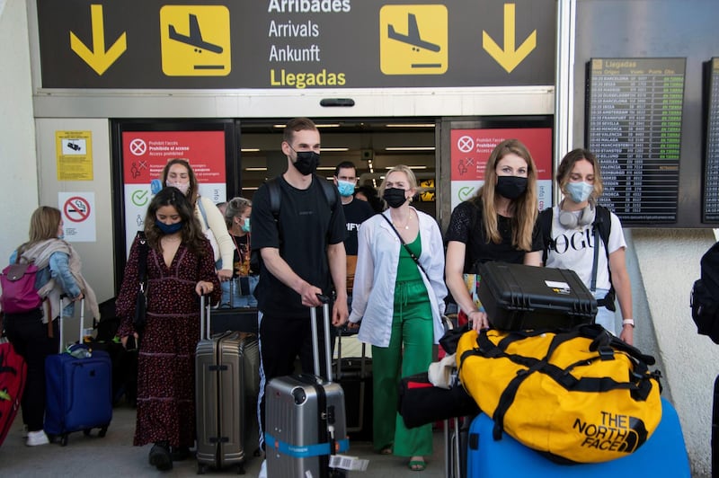 Tourists arrive at Son Sant Joan Airport in Palma Majorca, Spain. EPA