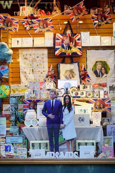 WINDSOR, ENGLAND - MAY 02:  Souvenirs featuring Britain's Prince Harry and his fiance, US actress Meghan Markle are displayed in a gift shop on May 2, 2018 in Windsor, England.  St George's Chapel at Windsor Castle will host the wedding of Britain's Prince Harry and US actress Meghan Markle on May 19. The town, which gives its name to the Royal Family, is ready for the event and the expected tens of thousands of royalists.  (Photo by Christopher Furlong/Getty Images)