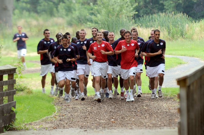 Lille players on a run alongside new coach Rudi Garcia on June 25, 2008 at Lille's training centre in Camphin-en-Pevele. AFP