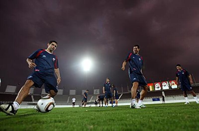 Atlante's Arturo Munoz Gutierrez, left, and Lucas Silva de Oliveira practice in Abu Dhabi.