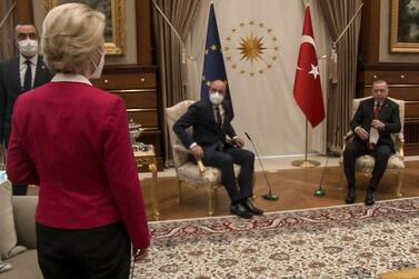 TOPSHOT - This video frame grab taken from footage released by The Turkish Presidency on April 6, 2021, shows Turkish President Recep Tayyip Erdogan (R) receiving EU Council President Charles Michel (C) and President of EU Commission Ursula von der Leyen (L) at the Presidential Complex in Ankara. The European Commission hit out April 7, 2021, at a diplomatic snub that left its head Ursula von der Leyen without a chair as male counterparts sat down at a meeting with Turkish President Recep Tayyip Erdogan. Video from the April 6, 2021, encounter in Ankara showed von der Leyen flummoxed as the Turkish leader and European Council president Charles Michel took the only two chairs in front of their flags. - RESTRICTED TO EDITORIAL USE - MANDATORY CREDIT "AFP PHOTO /TURKISH PRESIDENTIAL PRESS SERVICE " - NO MARKETING - NO ADVERTISING CAMPAIGNS - DISTRIBUTED AS A SERVICE TO CLIENTS / AFP / TURKISH PRESIDENTIAL PRESS SERVICE / - / RESTRICTED TO EDITORIAL USE - MANDATORY CREDIT "AFP PHOTO /TURKISH PRESIDENTIAL PRESS SERVICE " - NO MARKETING - NO ADVERTISING CAMPAIGNS - DISTRIBUTED AS A SERVICE TO CLIENTS