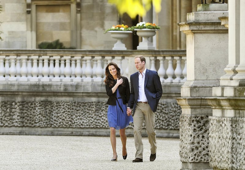 LONDON, ENGLAND - APRIL 30:  Prince William, Duke of Cambridge and Catherine, Duchess of Cambridge walk hand in hand from Buckingham Palace the day after their wedding to a waiting helicopter as they leave for a secret honeymoon location, on April 30, 2011 in London, England. The marriage of Prince William and Catherine Middleton was led by the Archbishop of Canterbury and was attended by 1900 guests, including foreign Royal family members and heads of state. Thousands of well-wishers from around the world have also flocked to London to witness the spectacle and pageantry of the Royal Wedding. (Photo by John Stillwell - WPA Pool/Getty Images)