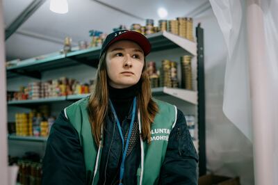 Tatyana Schetkevich fled Odesa on the second day of Russia's invasion and now volunteers in the MoldExpo centre in Chisinau, Moldova as a way to cope with her survivor's guilt. Erin Clare Brown / The National