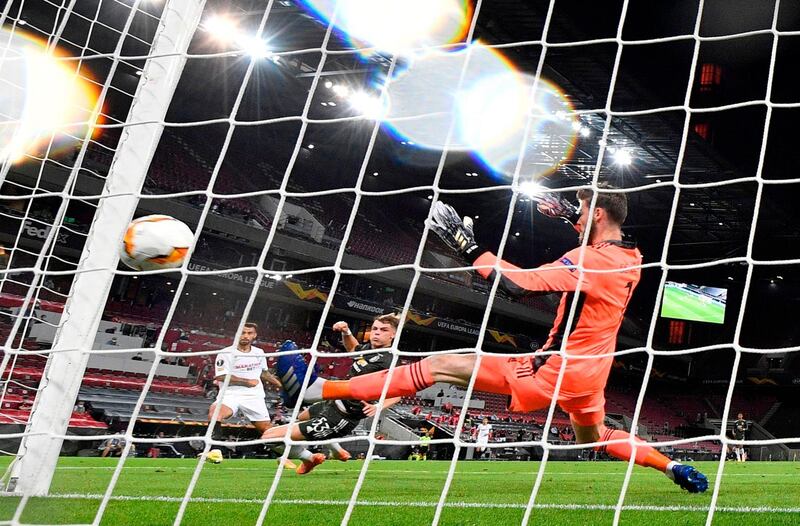 MANCHESTER UNITED: David de Gea 7. Man of match last time v Sevilla, not needed as much tonight. Recalled for Europa League game and made early stop from Ocampos. Could do little for either goal. AFP