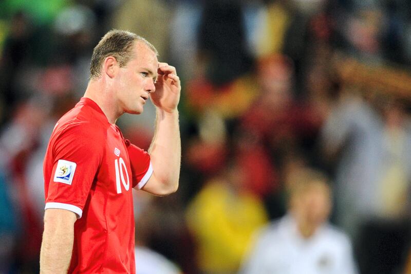 England's striker Wayne Rooney looks dejected after Germany won the 2010 World Cup round of 16 football match Germany vs. England on June 27, 2010 at Free State stadium in Mangaung/Bloemfontein. Germany won 4-1. NO PUSH TO MOBILE / MOBILE USE SOLELY WITHIN EDITORIAL ARTICLE  -      AFP PHOTO / FRANCOIS-XAVIER MARIT / AFP PHOTO / FRANCOIS-XAVIER MARIT