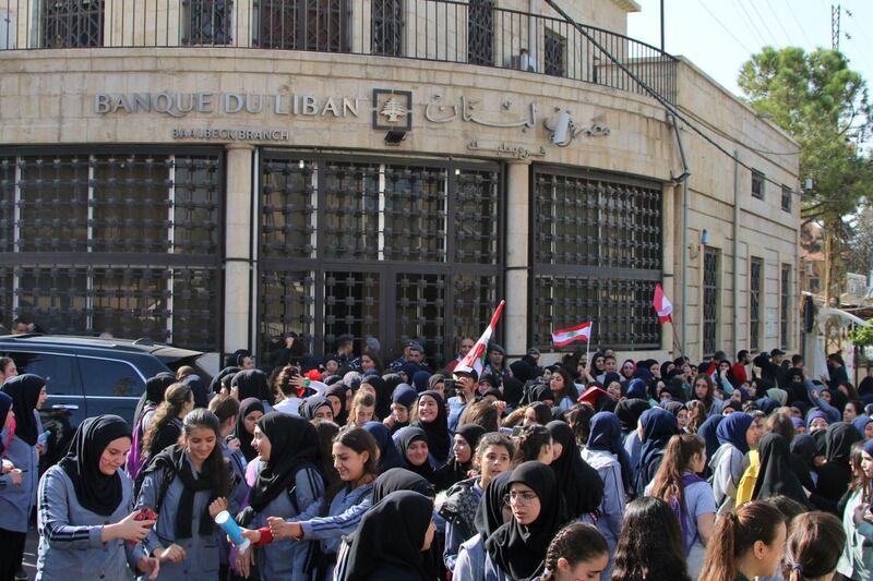 Lebanese students take part in an anti-government demonstration in front of the central bank in the eastern Bekaa Valley city of Baalbeck.  AFP