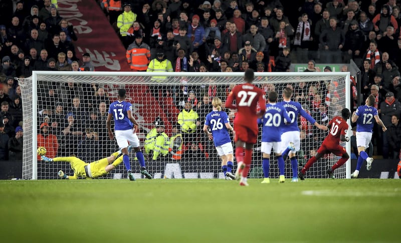 LIVERPOOL, ENGLAND - DECEMBER 04: Sadio Mane of Liverpool scores his teams 4th goal during the Premier League match between Liverpool FC and Everton FC at Anfield on December 04, 2019 in Liverpool, United Kingdom. (Photo by Clive Brunskill/Getty Images)