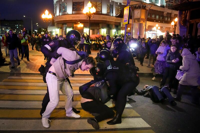 Demonstrators are detained during a protest against the mobilisation in Moscow. AP