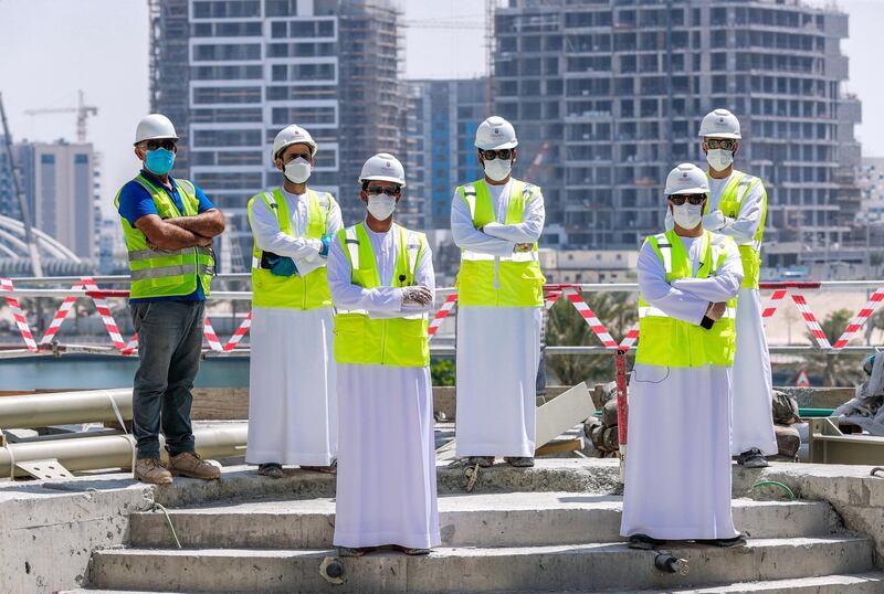 Abu Dhabi, United Arab Emirates, September 27, 2020.  Khaled Khamees Almarzooqi, (left front row) Head of Environment, Health and Safety Department and his team at the Al Raha Gardens, after conducting a safety inspection.
Victor Besa/The National
Section:  NA
Reporter:  Haneen Dajani
