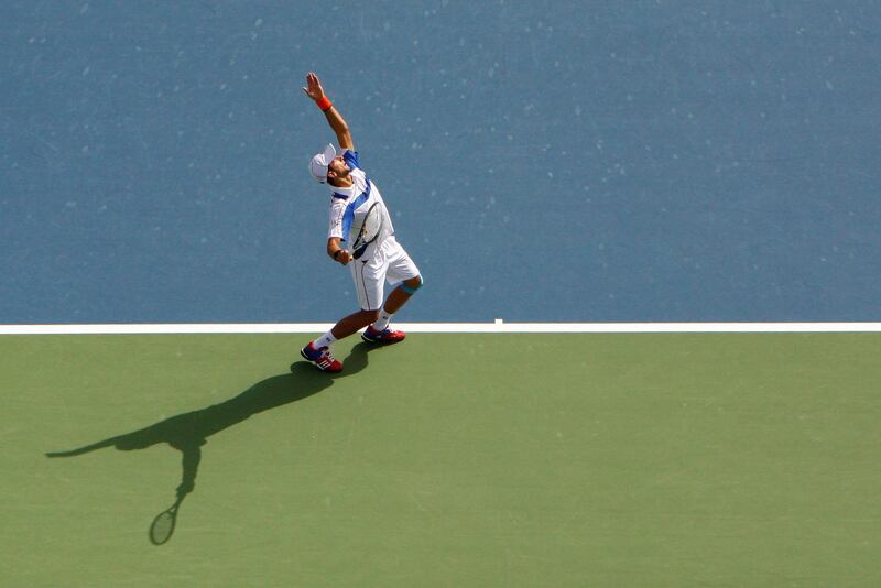 Dubai, UAE, Feb. 25 2011, Dubai Duty Free tennis Championship- Novak Djokovic serves to Tomas Berdych in the first set in the Dubai Duty Free Tennis Championship.  Mike Young / The National