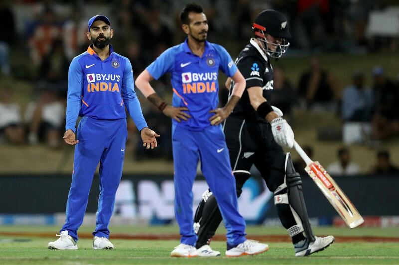 MOUNT MAUNGANUI, NEW ZEALAND - FEBRUARY 11: Virat Kohli of India questions Yuzvendra Chahal of India during game three of the One Day International Series between New Zealand and India at Bay Oval on February 11, 2020 in Mount Maunganui, New Zealand. (Photo by Hannah Peters/Getty Images)