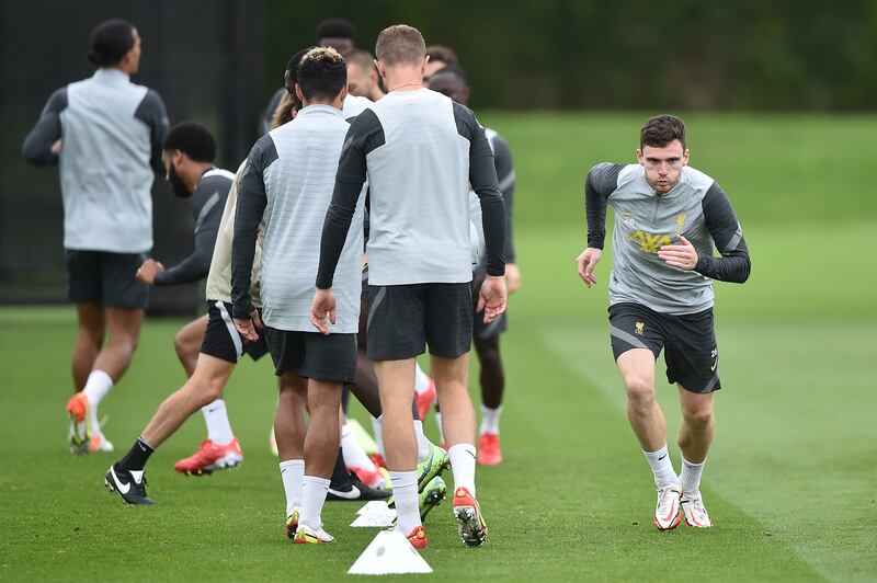 Liverpool full-back Andrew Robertson begins to sprint at training. Getty