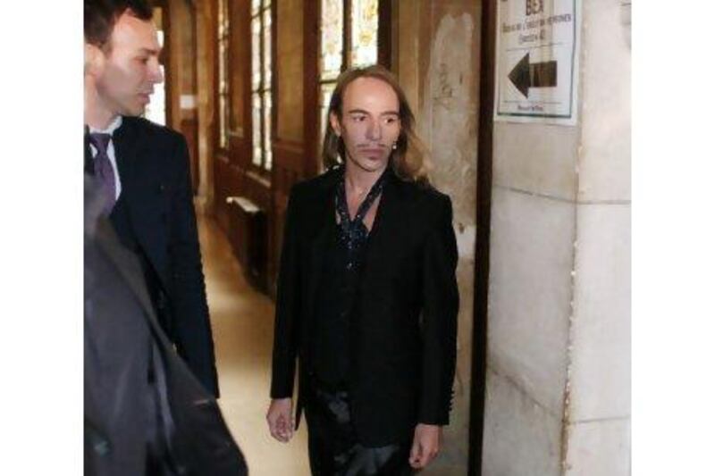 Former Dior designer John Galliano arrives at the Paris court house charged with hurling anti-Semitic slurs in a Paris cafe, allegations that shocked the fashion world and cost him his job. Thibault Camus / AP Photo