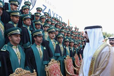 Sheikh Hamdan bin Mohammed, Crown Prince of Dubai, congratulates the graduating cadet officers. Wam