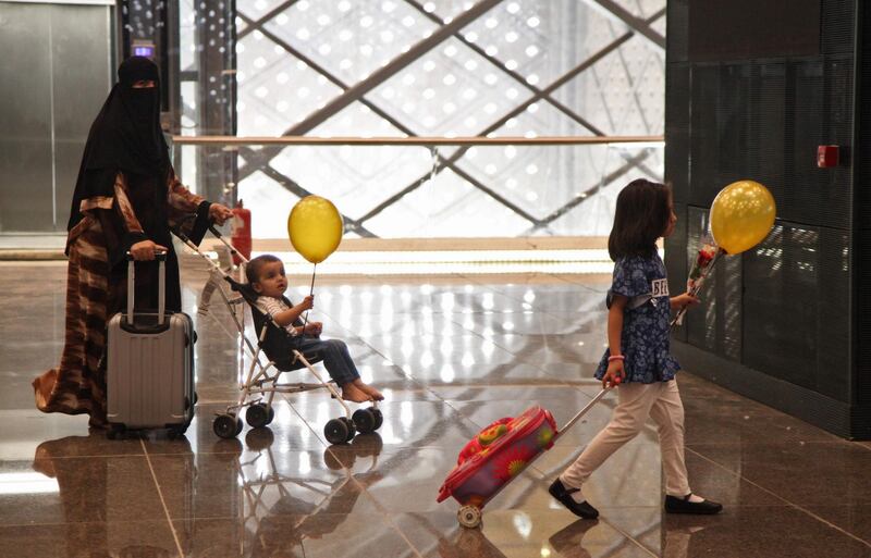 Saudi passengers walk through Makkah station's concourse. AFP