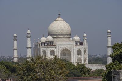 AGRA, INDIA - MARCH 18: A general view of the historic monument Taj Mahal, closed for tourists to prevent spread of Covid-19, on March 18, 2020 in Agra, India. With coronavirus cases in India inching towards 150, the government has decided to keep all the public monuments and museums - including the iconic Taj Mahal and Red fort - shut until the end of this month. This is only the third time in history that the historic monument has been closed. The number of Covid-19 cases continue to rise in India which is the second most populated country in the world behind China. (Photo by Yawar Nazir/Getty Images)