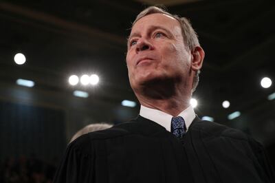 FILE PHOTO: U.S. Supreme Court Chief Justice John Roberts waits for U.S. President Donald Trump's State of the Union address to a joint session of the U.S. Congress in the House Chamber of the U.S. Capitol in Washington, U.S. February 4, 2020. REUTERS/Leah Millis//File Photo