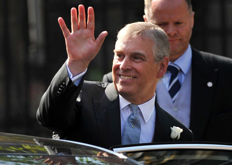 Britain's Prince Andrew leaves after attending the wedding of Zara Phillips, granddaughter of Britain's Queen Elizabeth II, and England rugby player Mike Tindall at Canongate Kirk in Edinburgh, Scotland, on July 30, 2011. AFP PHOTO / BEN STANSALL
 *** Local Caption ***  524466-01-08.jpg