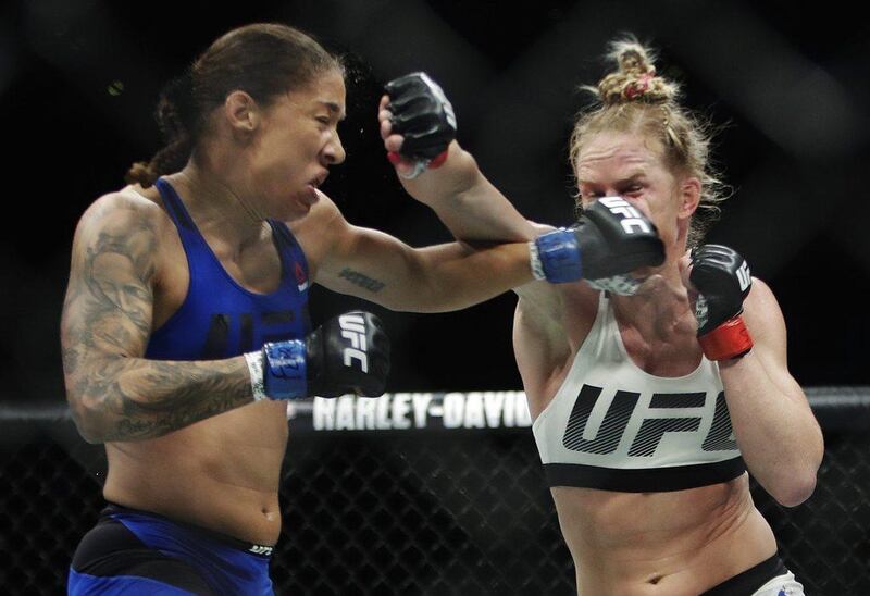 Germaine de Randamie punches Holly Holm. AP