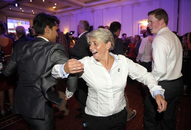 Pro-union supporters dance. Andy Buchanan / AFP Photo