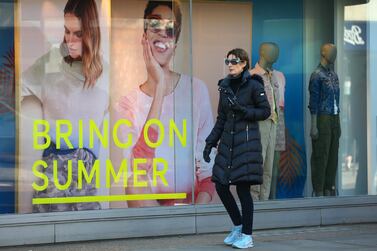 A pedestrian wearing a face shield passes a Marks & Spencer store in Chelsea, London, UK, April 20. Bloomberg