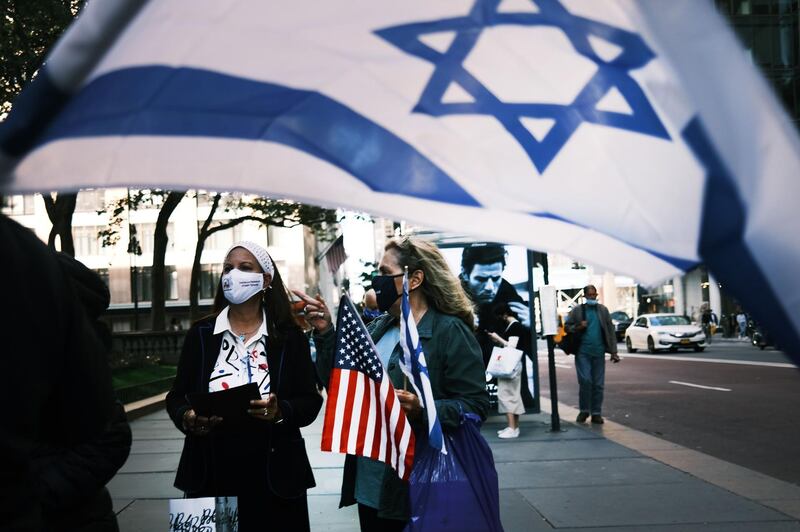 Protesters rally in Manhattan against the closing of some schools and businesses in Jewish neighborhoods in the Brooklyn and Queens boroughs of New York City due to a spike in the numbers of Covid-19 cases in these areas. AFP