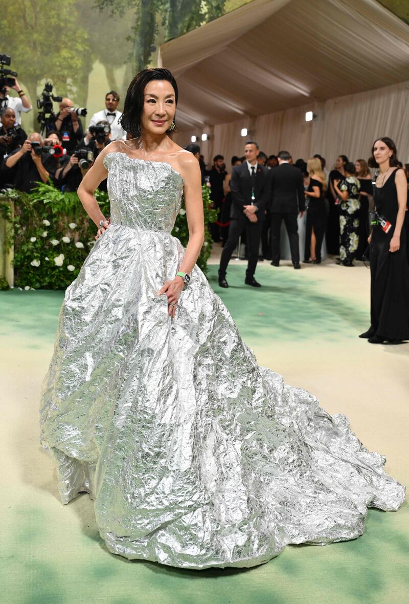 Michelle Yeoh wears Balenciaga. AFP