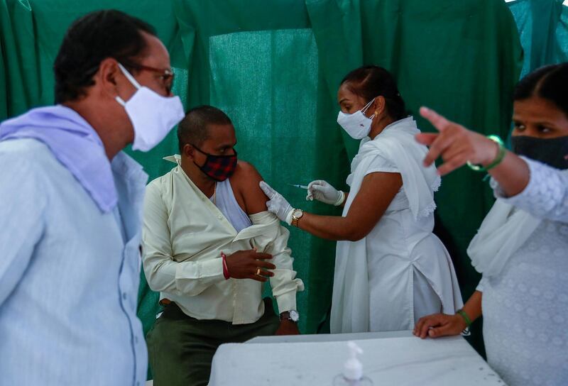 A health worker administers the Covidshield vaccine at a government hospital in Hyderabad. AP Photo