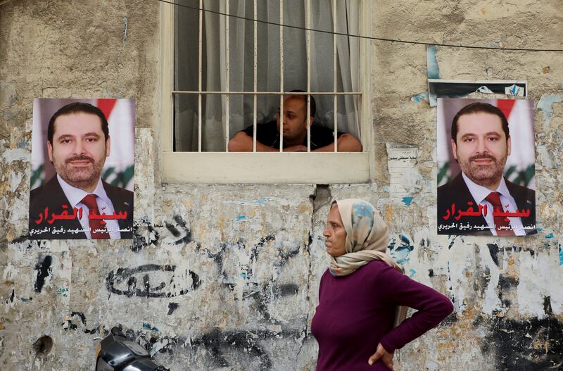 Posters in Al Tariq Al Jadida, Beirut, depict Lebanon’s former prime minister Saad Hariri. Reuters