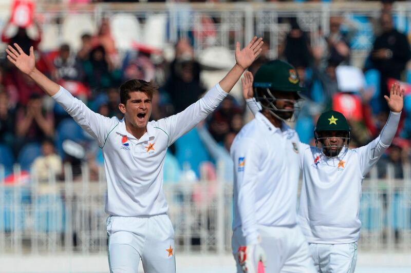 Pakistan's Shaheen Shah Afridi, left, appeals during the third day of the first Test. AFP
