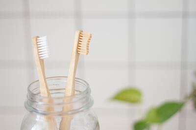 Bamboo toothbrushes are a great option to replace plastic. Unsplash