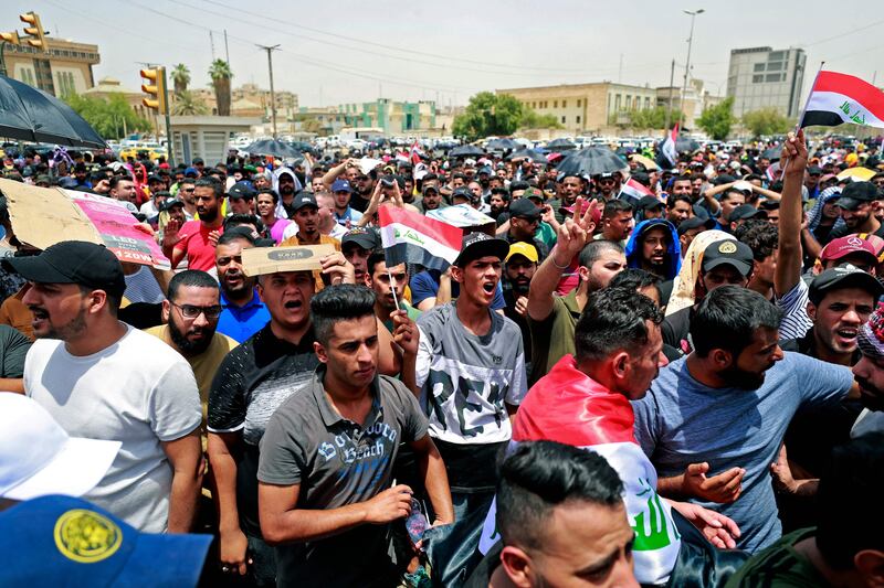Iraqis protest against the government’s employment policy in Baghdad's Green Zone. AFP