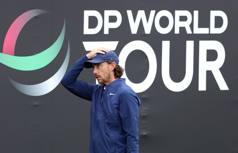 Tommy Fleetwood of England reacts ahead of a drop by the 9th hole green. Getty Images