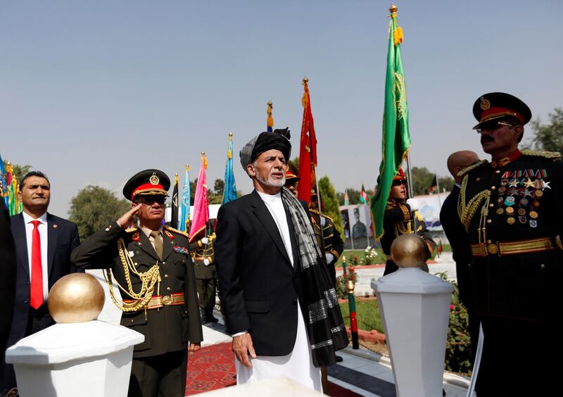 Afghan President Ashraf Ghani (C) attends Afghan Independence Day celebrations in Kabul. Mohammad Ismail / Reuters.