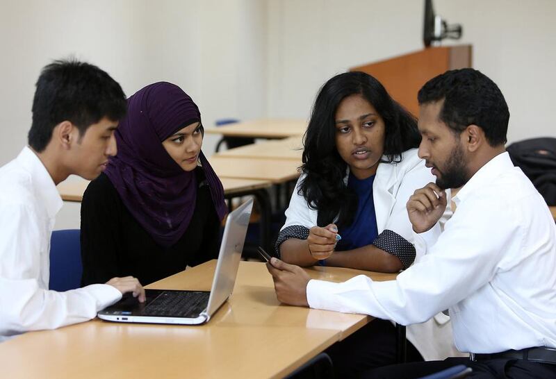 Fauzan Sudradjat, Nilufa Hoque, Lorain Manoj and Abdush Shakoor, students from the University of Wollongong in Dubai, have developed a learning app for children. Pawan Singh / The National