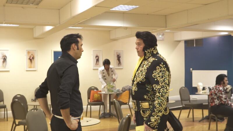 Elvis tribute acts chat in the green room at Porthcawl's Grand Pavilion.