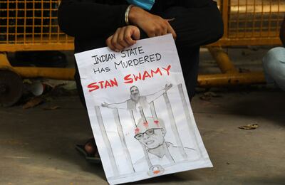 Activists protest in solidarity with Jesuit priest and activist Stan Swamy in New Delhi, India, in 2021. EPA