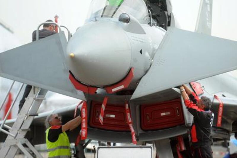 Employees set up an Eurofighter Typhoon airplane at the Paris International Air Show -- June 14, 2013 -- . (Antoine Antoine for The National)