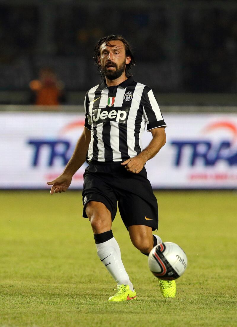 Pirlo controls the ball during a friendly match against Indonesia Super League All-Stars  in Jakarta, Indonesia, in 2014. AP