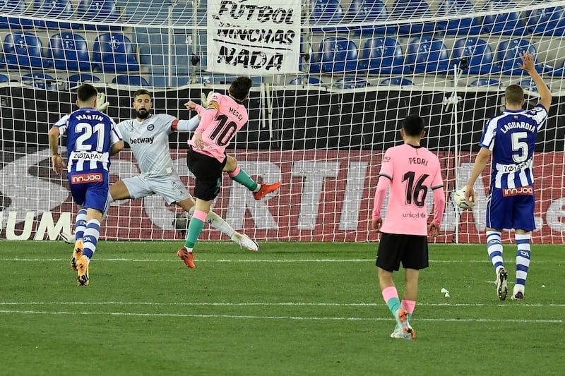Messi fails to score against Alaves goalkeeper Fernando Pacheco. AP