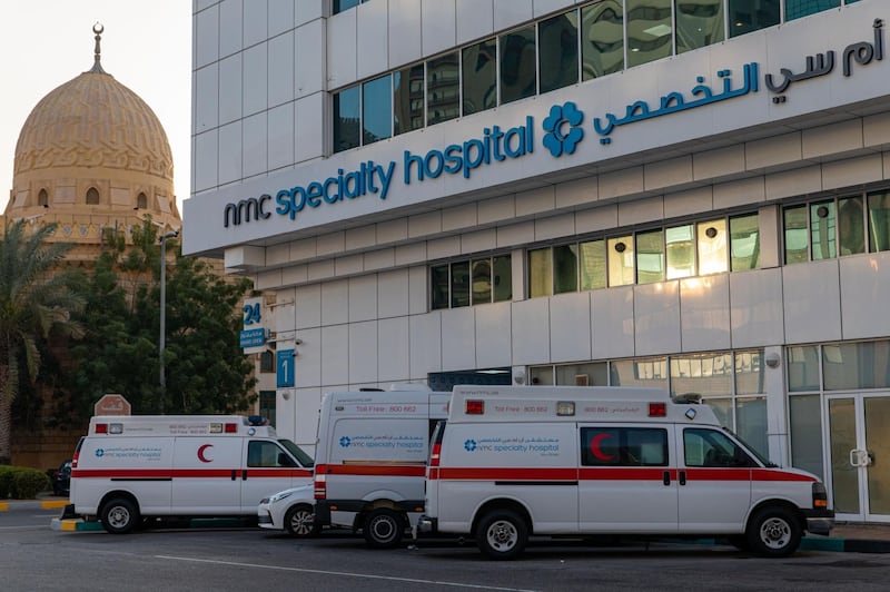 Ambulances sit outside the NMC Speciality Hospital, operated by NMC Health Plc, in Dubai, United Arab Emirates, on Sunday, March 1, 2020. Troubled NMC Health Plc, the largest private health-care provider in the United Arab Emirates, asked lenders for an informal standstill on its debt as Dubai weighs an injection of capital to safeguard the emirate’s reputation among global investors. Photographer: Christopher Pike/Bloomberg