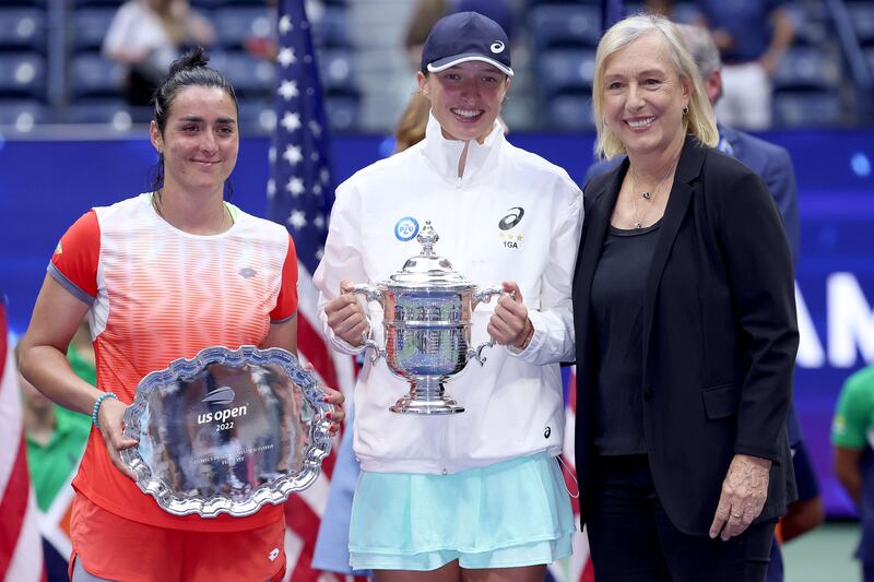 Ons Jabeur, Iga Swiatek, and Martina Navratilova pose for a picture after the US Open final at USTA Billie Jean King National Tennis Center on September 10, 2022 in New York City. AFP