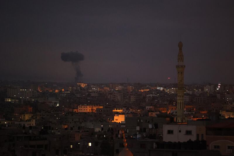 Smoke billows following an Israeli airstrike at Gaza city. AFP
